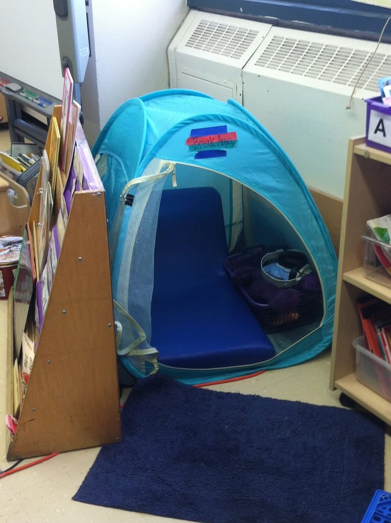 Sensory tent in a classroom to provide a safe space away from visual fatigue